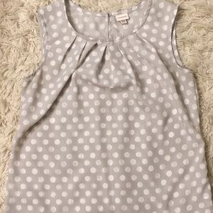 Sleeveless tank top. Excellent condition.